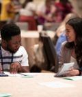 Two NSPRA members talking at an NSPRA Seminar.